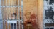 ‘Stay Tuned’, Cellblock A, cell with stool for listening to poem ‘A Homesick Sparrow’ by Sudanese poet Mahjoub Sharif. Detail of @Large, photograph by Susan Platt