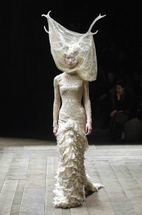 Alexander McQueen, Tulle and lace dress with veil and antlers Widows of Culloden AW 2006–7. Model Raquel Zimmermann Viva London. Image firstVIEW
