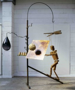 Bill Woodrow RA, Beekeeper and Four Hives (1997) Glass, urethane foam, wood, steel, wax, rope, gold leaf, shellac, 300x220x174 cm  Collection of the artist