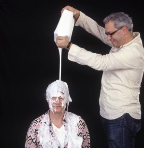 Antony Buck pouring out skin unfriendly products over REN Co-Founder   Robert Calcraft