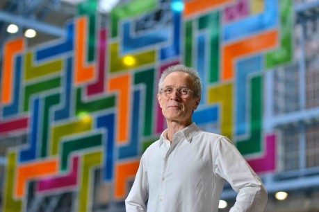 David Batchelor in front of part of Chromolocomotion at St Pancras International railway station, London.  © HS1 Ltd