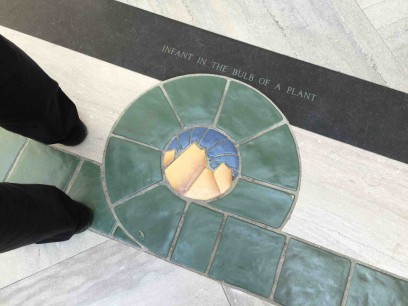 Diego Rivera, detail of floor showing title of upper register of Rivera mural on east wall