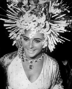 Elizabeth Taylor wears Bulgari jewellery at the masked ball, Hotel Ca'Rezzonico, Venice,1967