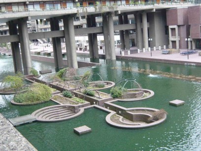 Reinforced concrete columns support the building over the central pool