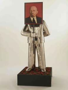 Grisha Bruskin, Man with Portrait of Lenin (From the series Paradise Lost), 1990. Installation, stainless steel, aluminum, industrial enamel, 200x86.4x68.5cm. Image courtesy the Sepherot Foundation, Liechtenstein