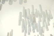 Edmund de Waal  A thousand hours, 2012  Photo Benjamin McMahon Please note this is not an image of the commission. These are examples of vessels 'floating' in a vitrine of translucent glass