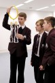 Harrison Braithwaite, William Thayre &  Adam Loughran examine Ted Noten's 'Erenhot' necklace © Teesside University