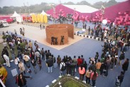 Visitors at India Art Fair 2014 in New Delhi watching a performance by Anindita Dutta, sponsored by Latitude 28, New Delhi, courtesy of India Art Fair